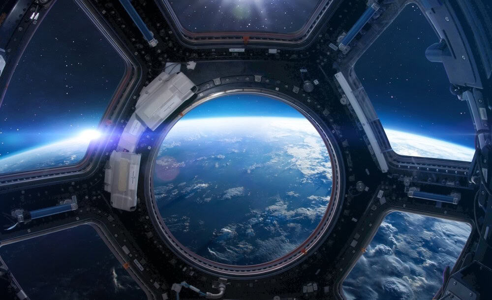 image (18) Earth viewed from space through spacecraft window, showcasing space exploration and astronomy visuals.